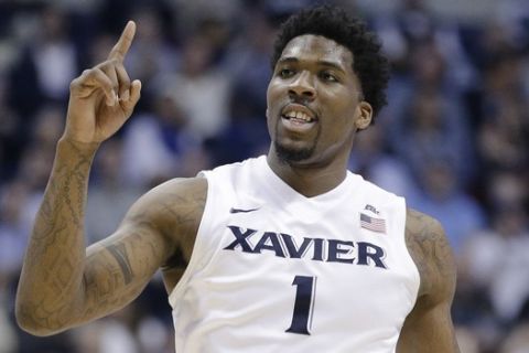 Xavier's Jalen Reynolds reacts in the second half of an NCAA college basketball game against Providence, Wednesday, Feb. 17, 2016, in Cincinnati. Xavier won 85-74. (AP Photo/John Minchillo)