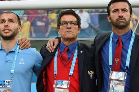 CURITIBA, BRAZIL - JUNE 26:  Head coach Fabio Capello of Russia (C) looks on during the 2014 FIFA World Cup Brazil Group H match between Algeria and Russia at Arena da Baixada on June 26, 2014 in Curitiba, Brazil.  (Photo by Matthias Hangst/Getty Images)