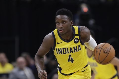 Indiana Pacers' Victor Oladipo (4) dribbles during the second half of an NBA basketball game against the Toronto Raptors, Friday, Feb. 7, 2020, in Indianapolis. Toronto won 115-106. (AP Photo/Darron Cummings)