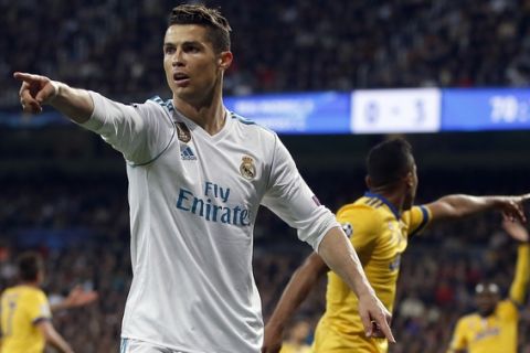 Real Madrid's Cristiano Ronaldo gestures during a Champions League quarter-final, 2nd leg soccer match between Real Madrid and Juventus at the Santiago Bernabeu stadium in Madrid, Spain, Wednesday, April 11, 2018. (AP Photo/Paul White)