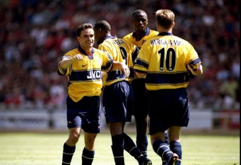 9 Aug 1998:  Marc Overmars (left) of Arsenal celebrates his goal during the FA Charity Shield match against Manchester Untied at Wembley Stadium in London. Arsenal won 3-0.  \ Mandatory Credit: Ross Kinnaird /Allsport