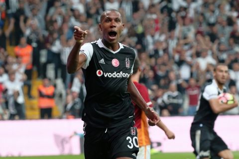 In this Saturday, Sept. 24, 2016 photo, Marcelo Guedes of Besiktas celebrates after he scored during their Turkish League soccer derby match with Galatasaray at the Vodafone Arena Stadium in Istanbul, Turkey. (AP Photo)