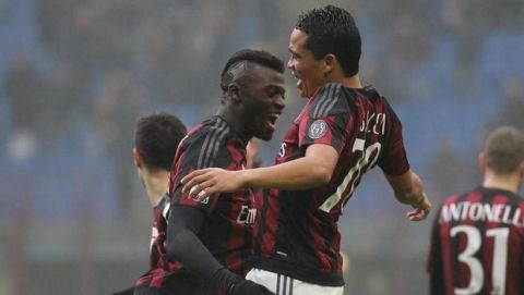 Ac Milan forward Carlos Bacca (R) celebrates with his teammate  M'baye Niang  after scoring the lead of 1 to 0 during the Italian serie A soccer match between AC Milan and Genoa  at Giuseppe Meazza stadium in Milan, 14 February  2016. 
ANSA / MATTEO BAZZI