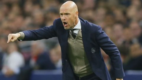 Ajax's head coach Erik Ten Hag gives directions to his players during a Group E Champions League soccer match between Ajax and Benfica at the Johan Cruyff ArenA in Amsterdam, Netherlands, Tuesday, Oct. 23, 2018. (AP Photo/Peter Dejong)