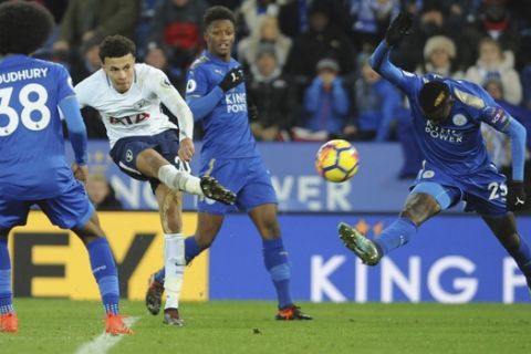 Tottenham's Dele Alli, center left, has a shot at goal during the English Premier League soccer match between Leicester City and Tottenham Hotspur at the King Power Stadium in Leicester, England, Tuesday, Nov. 28, 2017. (AP Photo/Rui Vieira)