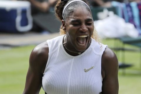 United States' Serena Williams reacts as she plays Czech Republic's Barbora Strycova in a Women's semifinal singles match on day ten of the Wimbledon Tennis Championships in London, Thursday, July 11, 2019. (AP Photo/Ben Curtis)