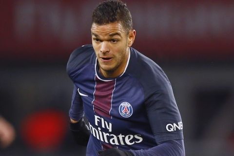 FILE - In this Sunday, Nov. 6, 2016 file photo, PSG's Hatem Ben Arfa runs with the ball during their French League One soccer match between PSG and Rennes at the Parc des Princes stadium in Paris, France. Ben Arfa has relaunched his flagging career at Rennes following a miserable end to his short Paris Saint-Germain career. The 31-year-old winger, who was out of contract, completed a move to Rennes Sunday, Sept. 2, 2018 on a one-year deal with an option for an extra year. (AP Photo/Francois Mori, File)