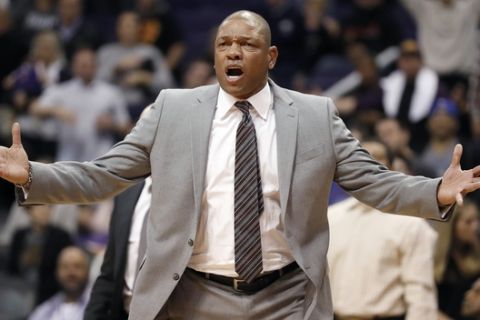 LA Clippers head coach Doc Rivers reacts during the second half of an NBA basketball game agasint the Phoenix Suns, Monday, Dec. 10, 2018, in Phoenix. The Clippers won 123-119 in overtime. (AP Photo/Matt York)