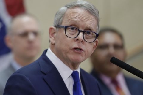 Ohio Governor Mike DeWine gives an update at MetroHealth Medical Center on the state's preparedness and education efforts to limit the potential spread of a new virus which caused a disease called COVID-19, Thursday, Feb. 27, 2020, in Cleveland. (AP Photo/Tony Dejak)