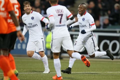 Paris Saint Germain's forward Hervin Ongenda jubilate after scoring the first goal during his French League One soccer match against Lorient, Saturday, Nov. 21, 2015, in Lorient, western France. (AP Photo/David Vincent)
