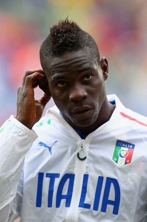 NATAL, BRAZIL - JUNE 24:  Mario Balotelli of Italy looks on prior to the 2014 FIFA World Cup Brazil Group D match between Italy and Uruguay at Estadio das Dunas on June 24, 2014 in Natal, Brazil.  (Photo by Clive Rose/Getty Images)