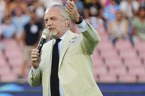 Napoli president Aurelio De Laurentiis introduces Argentine striker striker Gonzalo Higuain to Napoli cheering fans during his presentation at the San Paolo stadium in Naples Monday, July 29, 2013. The 25-year-old striker who helped Real Madrid win the Spanish league in 2007, 2008 and 2012, signed for Napoli. The transfer reportedly cost Napoli 40 million euros ($53 million) for Higuain to play under newly appointed coach Rafa Benitez. (AP Photo/Salvatore Laporta)
