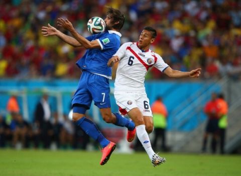 RECIFE, BRAZIL - JUNE 29: Giorgos Samaras of Greece controls the ball against Oscar Duarte of Costa Rica during the 2014 FIFA World Cup Brazil Round of 16 match between Costa Rica and Greece at Arena Pernambuco on June 29, 2014 in Recife, Brazil.  (Photo by Ian Walton/Getty Images)