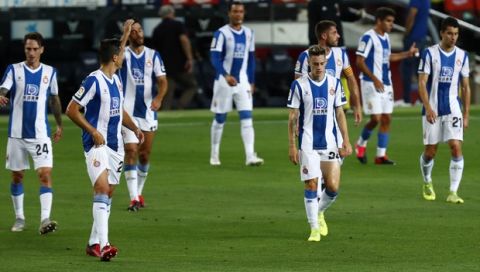 Espanyol's players during the Spanish La Liga soccer match between FC Barcelona and RCD Espanyol at the Camp Nou stadium in Barcelona, Spain, Wednesday, July 8, 2020. (AP Photo/Joan Monfort)