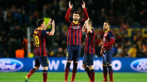 BARCELONA, SPAIN - MARCH 12:  (L-R) Lionel Messi, Gerard Pique, Andres Iniesta and Jordi Alba of Barcelona celebrate their team's 2-1 victory during the UEFA Champions League Round of 16, second leg match between FC Barcelona and Manchester City  at Camp Nou on March 12, 2014 in Barcelona, Spain.  (Photo by David Ramos/Getty Images)