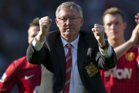 Manchester United manager Alex Ferguson gestures to supporters after the English Premier League soccer match away against  West Bromwich Albion, his last as manager of Manchester United, at The Hawthorns Stadium, West Bromwich, England, Sunday May. 19, 2013. (AP Photo/Jon Super)