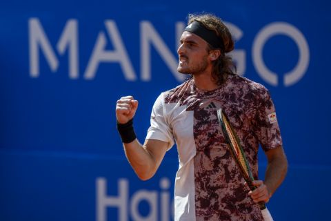 Stefanos Tsitsipas, of Greece, celebrates his victory over Lorenzo Musetti, of Italy, during a semi final open tennis tournament, in Barcelona, Spain, Saturday, April 22, 2023. (AP Photo/Joan Monfort)