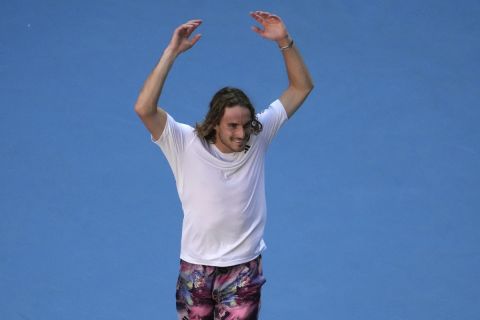 Stefanos Tsitsipas of Greece reacts after defeating Karen Khachanov of Russia in their semifinal at the Australian Open tennis championship in Melbourne, Australia, Friday, Jan. 27, 2023.(AP Photo/Ng Han Guan)