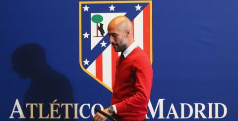 "MADRID, SPAIN - APRIL 26:  Josep Guardiola, head coach of FC Bayern Muenchen arrives for a FC Bayern Muenchen press conference on the eve of the UEFA Champions League Semi Final First Leg between Club Atletico de Madrid and FC Bayern Muenchen at Estadio Vicente Calderon on April 26, 2016 in Madrid, Spain.  (Photo by Alexander Hassenstein/Bongarts/Getty Images)"