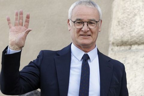 FILE - In this Thursday, March 30, 2017 file photo, soccer coach Claudio Ranieri waves from a balcony of Rome's Capitol Hill,  after receiving an honorary award for his work at Leicester City. The arrival of Claudio Ranieri as Fulhams new coach should ensure an end to the chaotic selections, loose defending and naive approach that marked the teams turbulent first three months back in the Premier League.  (AP Photo/Andrew Medichini, File)
