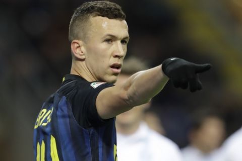 Inter Milans Ivan Perisic gestures during a Serie A soccer match between Inter Milan and Chievo, at the San Siro stadium in Milan, Italy, Saturday, Jan. 14, 2017. (AP Photo/Luca Bruno)