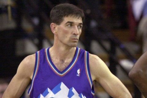 Utah Jazz's John Stockton, left, and Karl Malone watch as the Sacramento Kings walk onto the court following a time-out during the third quarter of Game 5 of the Western Conference first-round playoff series, Wednesday, April 30, 2003, in Sacramento, Calif.  The Kings won 111-91, winning the series 4-1. (AP Photo/Rich Pedroncelli)