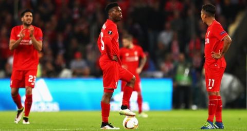 "BASEL, SWITZERLAND - MAY 18:  Daniel Sturridge (C) and Roberto Firmino (R) of Liverpool react after Sevilla's second goal during the UEFA Europa League Final match between Liverpool and Sevilla at St. Jakob-Park on May 18, 2016 in Basel, Switzerland.  (Photo by Julian Finney/Getty Images)"