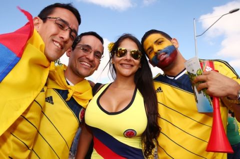 BELO HORIZONTE, BRAZIL - JUNE 14:  A Colombia fan enjoys the atmosphere prior to the 2014 FIFA World Cup Brazil Group C match between Colombia and Greece at Estadio Mineirao on June 14, 2014 in Belo Horizonte, Brazil.  (Photo by Ian Walton/Getty Images)