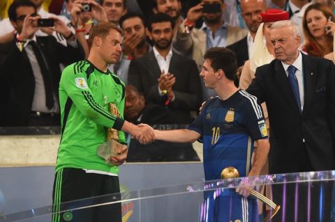 RIO DE JANEIRO, BRAZIL - JULY 13:  Golden Glove winner Manuel Neuer of Germany shakes hands with Golden Ball winner Lionel Messi of Argentina after Germany's 1-0 win in extra time during the 2014 FIFA World Cup Brazil Final match between Germany and Argentina at Maracana on July 13, 2014 in Rio de Janeiro, Brazil.  (Photo by Laurence Griffiths/Getty Images)