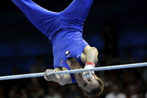 Aljaz Pegan from Slovenia performs on the horizontal bar during the apparatus finals at the European Men's Artistic Gymnastics Championships on Sunday May 11, 2008 at the Malley Sport Centre in Lausanne, Switzerland. (AP Photo/KEYSTONE/Laurent Gillieron) *** NO COMMERCIAL USE, EDITORIAL USE ONLY ***