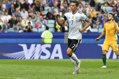 Germany's Julian Draxler celebrates after scoring his side's second goal during the Confederations Cup, Group B soccer match between Australia and Germany, at the Fisht Stadium in Sochi, Russia, Monday, June 19, 2017. (AP Photo/Martin Meissner)