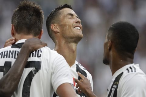 Juventus' Cristiano Ronaldo controls the ball during a Serie A soccer match between Juventus and Lazio, at the Allianz stadium in Turin, Italy,Saturday, Aug. 25, 2018. (AP Photo/Luca Bruno)