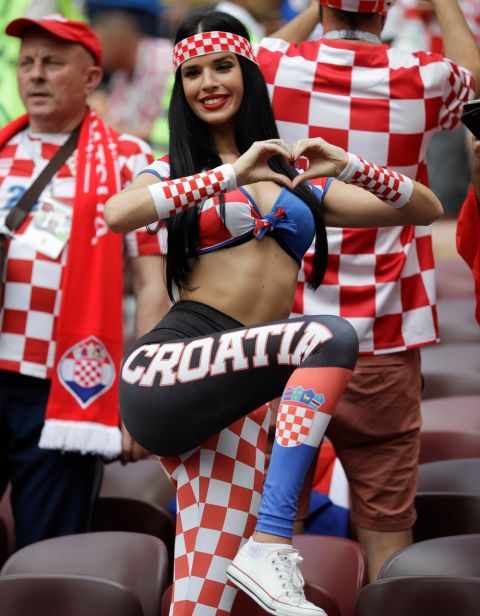 A fan poses for photographers before the final match between France and Croatia at the 2018 soccer World Cup in the Luzhniki Stadium in Moscow, Russia, Sunday, July 15, 2018. (AP Photo/Matthias Schrader)