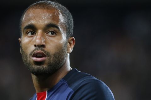 FILE - In this Sunday, Aug. 16, 2015, file photo, Paris saint Germain's Lucas Moura is seen during his French League one soccer match between Paris Saint Germain and Ajaccio Gazelec, at the Parc des Princes stadium in Paris, France. The Brazilian winger Lucas is finally fulfilling his potential for Paris Saint-Germain, five years after joining as an intimated teen with a big price tag weighing him down. Lucas netted his 11th goal of the season in Wednesday nights 4-0 French Cup win against Rennes. (AP Photo/Jacques Brinon, File)