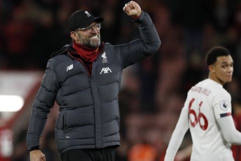 Liverpool's manager Jurgen Klopp celebrates at the end of the English Premier League soccer match between Bournemouth and Liverpool at the Vitality stadium in Bournemouth, England, Saturday, Dec. 7, 2019. Liverpool won 3:0. (AP Photo/Alastair Grant)