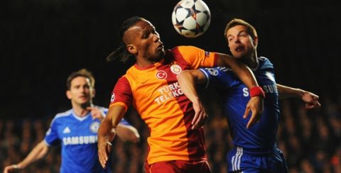 LONDON, ENGLAND - MARCH 18:  Didier Drogba of Galatasaray battles with Cesar Azpilicueta of Chelsea during the UEFA Champions League Round of 16 second leg match between Chelsea and Galatasaray AS at Stamford Bridge on March 18, 2014 in London, England.  (Photo by Mike Hewitt/Getty Images)