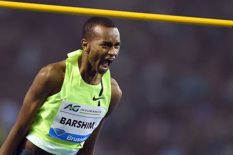 Qatar's Mutaz Essa Barshim reacts after winning the Men's High Jump during the Memorial Van Damme athletics Diamond League meeting in Brussels, on September 5, 2014.  AFP PHOTO / EMMANUEL DUNAND