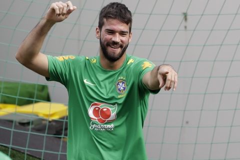 Brazil goalkeeper Alisson attends a training session in Sochi, Russia, Tuesday, June 19, 2018. Brazil will face Costa Rica on June 22 in the group E for the soccer World Cup. (AP Photo/Andre Penner)