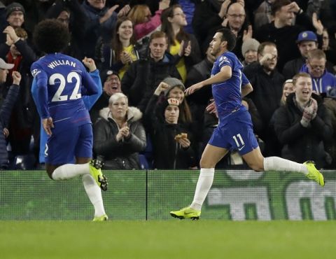 Chelsea's Pedro, right, celebrates after scoring his side's first goal during the English Premier League soccer match between Chelsea and Newcastle United at Stamford Bridge stadium in London, Saturday, Jan. 12, 2019. (AP Photo/Matt Dunham)