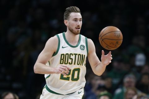 Boston Celtics' Gordon Hayward brings the ball up court during the first half on an NBA basketball game against the New York Knicks in Boston, Wednesday, Nov. 21, 2018. (AP Photo/Michael Dwyer)