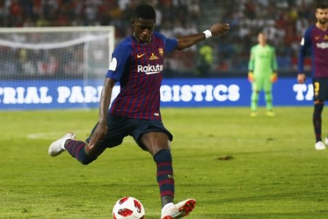 Barcelona's Ousmane Dembele scores his side's second goal during the Spanish Super Cup soccer match between Sevilla and Barcelona in Tangier, Morocco, Sunday, Aug. 12, 2018. (AP Photo/Mosa'ab Elshamy)