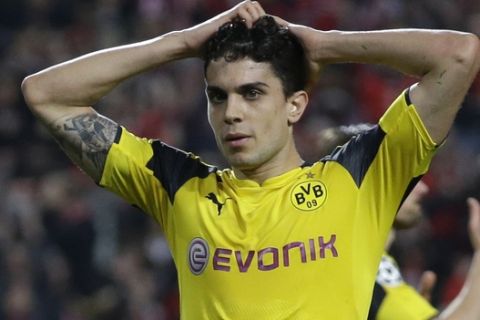 FILE - In this Feb. 14, 2017 fie photo, Dortmund's Marc Bartra reacts during the Champions League round of 16, first leg, soccer match between Benfica and Borussia Dortmund in Lisbon. Marc Bartra, who was wounded in an attack on the team bus of German soccer club Borussia Dortmund Tuesday, April 11, 2017 said Friday April 14, 2017 the experience was the "hardest 15 minutes" of his life. (AP Photo/Armando Franca, FILE)