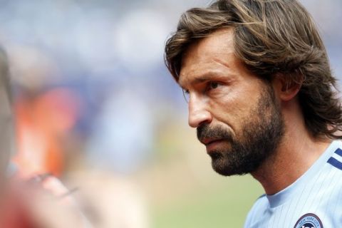 New York City FC's Andrea Pirlo, of Italy, walks off the pitch after warming up before an MLS soccer game against Orlando City SC at Yankee Stadium, Sunday, July 26, 2015, in New York. New York defeated Orlando 5-3. (AP Photo/Jason DeCrow)  