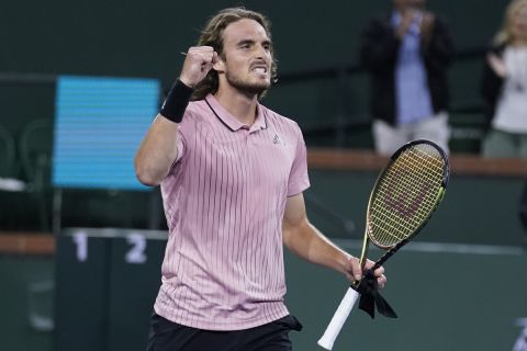 Stefanos Tsitsipas, of Greece, reacts to winning a match against Jack Sock at the BNP Paribas Open tennis tournament Saturday, March 12, 2022, in Indian Wells, Calif. (AP Photo/Marcio Jose Sanchez)