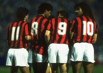 1989:  (left to right) Carlo Ancelloti, Frank Rijkaard, Marco Van Basten and Ruud Gullit of AC Milan line up in the wall against Real Madrid during the European Cup semi-final played at the Sansiro stadium in Milan.  AC Milan won the match 5-0. \ Mandatory Credit: Simon  Bruty/Allsport