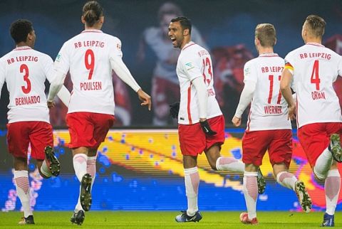 Leipzig´s defender Marvin Compper (C) celebrates with his teamate after scoring the first goal during the German first division Bundesliga football match between RB Leipzig and Eintracht Frankfurt in Leipzig, eastern Germany on January 21, 2017.  / AFP / ROBERT MICHAEL        (Photo credit should read ROBERT MICHAEL/AFP/Getty Images)