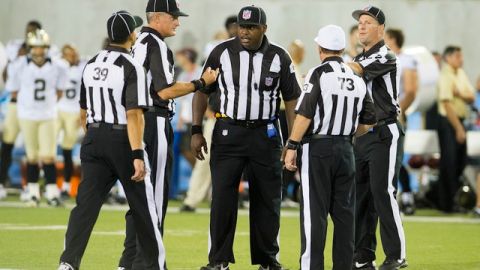 CANTON, OH - AUGUST 5: Game officials discuss the running of a play during the second half of the Pro Football Hall of Fame game at Fawcett Stadium on August 5, 2012 in Canton, Ohio. The Saints defeated the Cardinals 17-10. (Photo by Jason Miller/Getty Images)  *** Local Caption ***