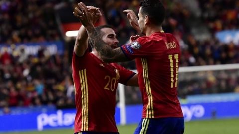 Spain's Vitolo, right, celebrates his goal with teammate Dani Carvajal after scoring during a 2018 World Cup Group G qualifying soccer match between Spain and Israel, at El Molinon Stadium, in Gijon, northern Spain, Friday, March 24, 2017. (AP Photo/Alvaro Barrientos)