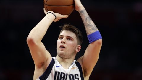 Dallas Mavericks' Luka Doncic shoots during the second half of an NBA basketball game against the Los Angeles Clippers Thursday, Dec. 20, 2018, in Los Angeles. (AP Photo/Marcio Jose Sanchez)