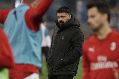 AC Milan coach Gennaro Gattuso looks to the players prior to the start of the Italian Cup, first leg semifinal soccer match between Lazio and AC Milan at the Olympic stadium in Rome, Italy, Tuesday, Feb.25, 2019. (AP Photo/Gregorio Borgia)